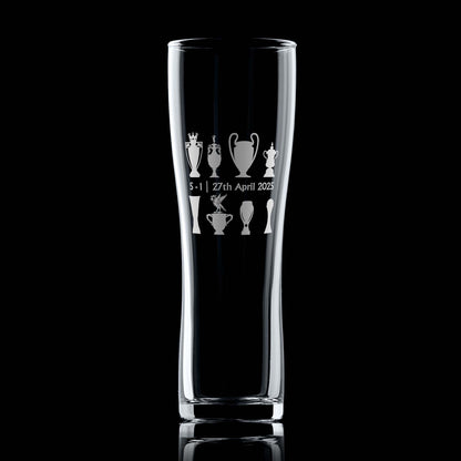 Engraved pint glass with trophy line-up and Liver Bird design, photographed front-facing on a black background