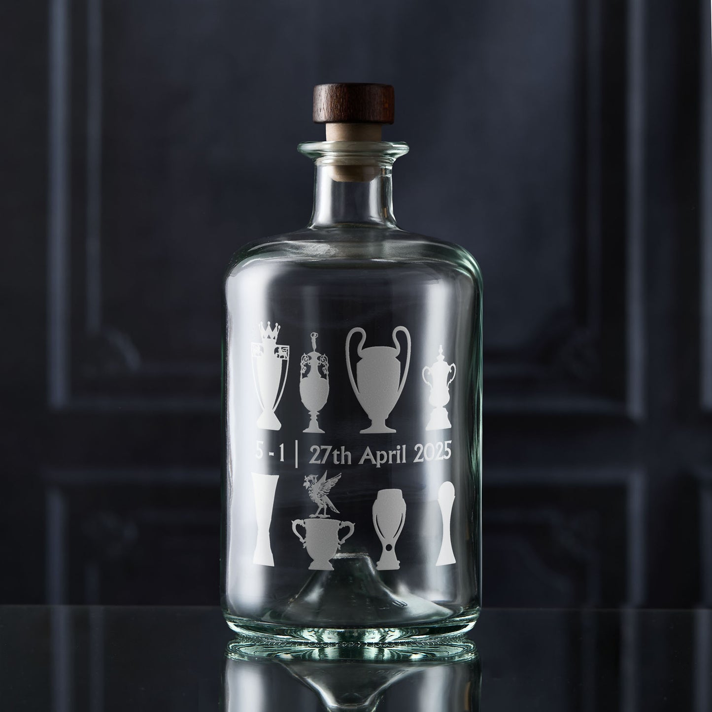 Liverpool decanter engraved with the liverbird, match score and eight football championship trophies