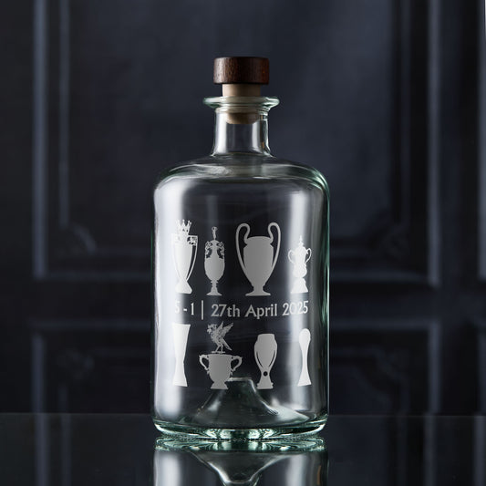 Liverpool decanter engraved with the liverbird and eight football championship trophies