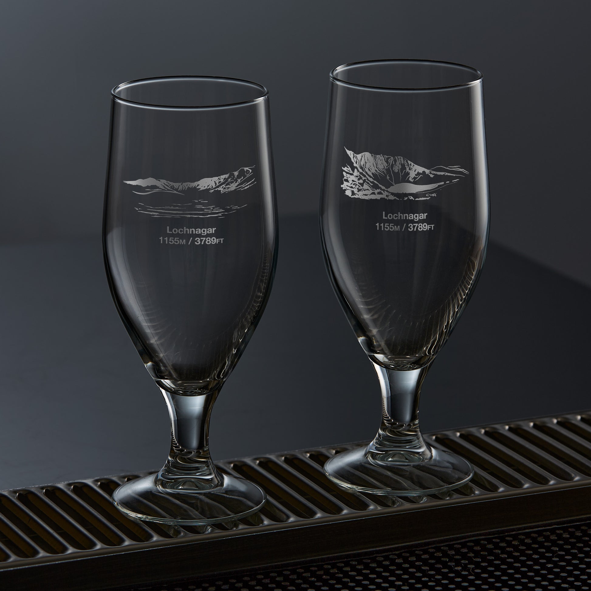 engraved mountain stemmed beer glasses etched with lochnagar's north corrie and meikle pap