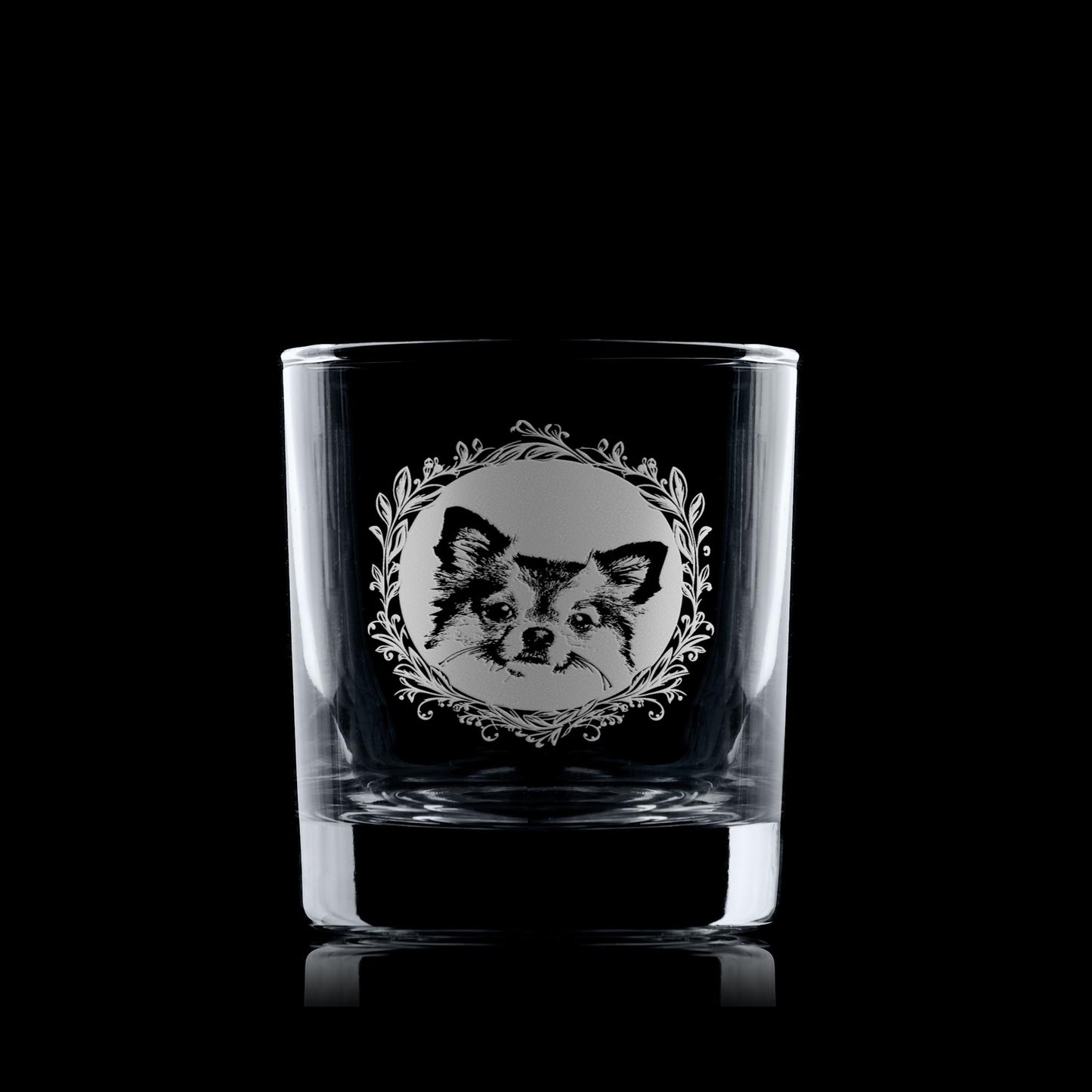 Whiskey tumbler with engraved long haired chihuahua portrait in circular frame with leafy garland