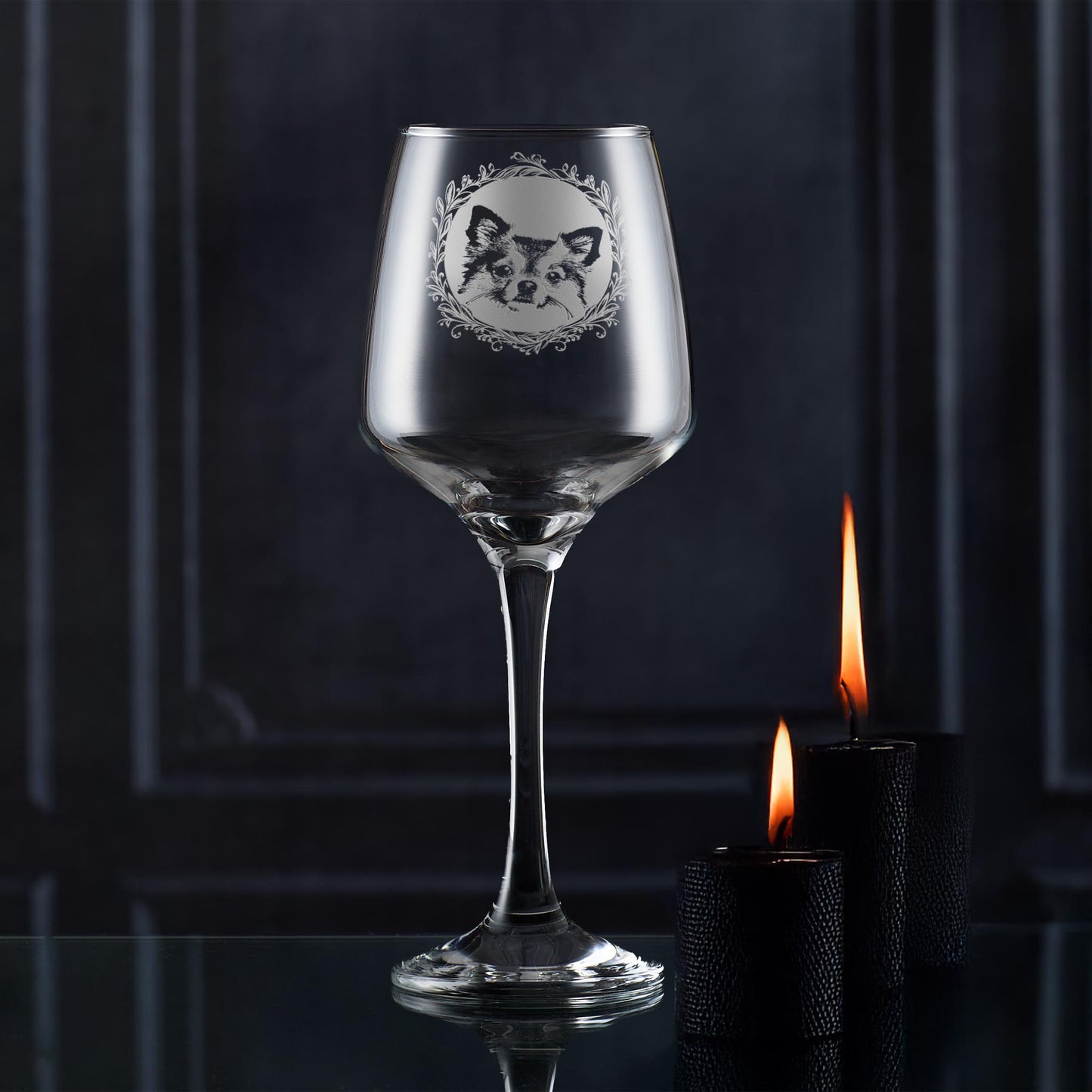 Wine glass with engraved longhaired chihuahua portrait in circular frame with leafy garland
