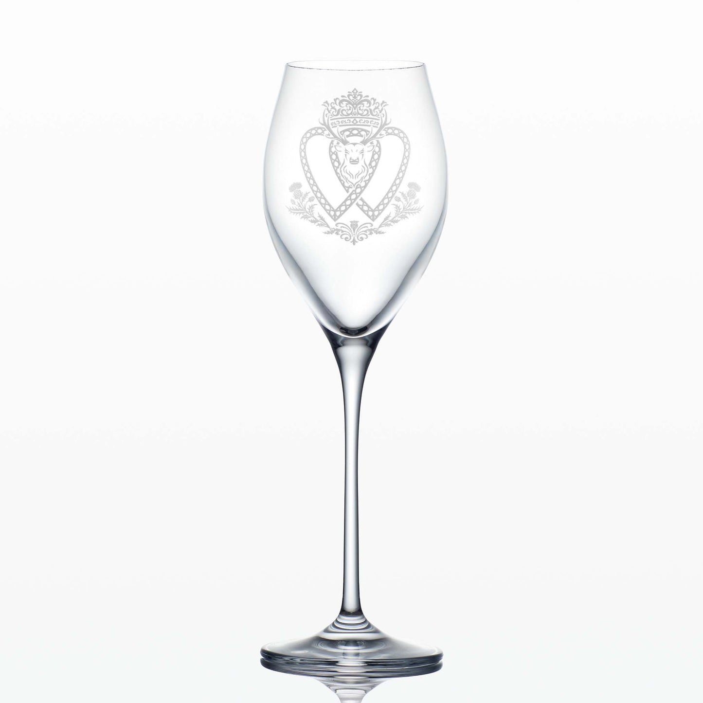 Tulip-shaped Atelier prosecco glass with Luckenbooth engraving, shown on white background to highlight refined shape and clarity