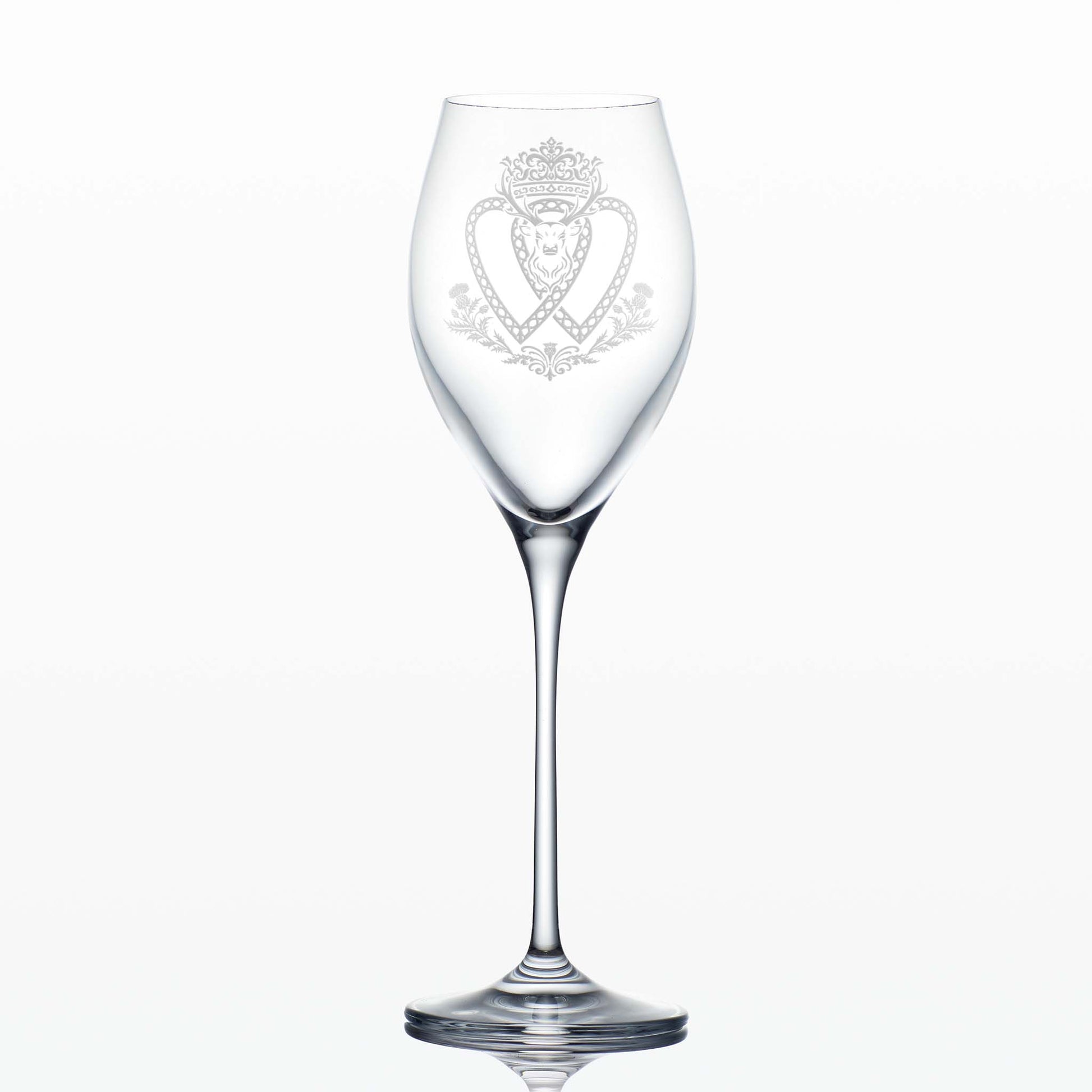 Tulip-shaped Atelier prosecco glass with Luckenbooth engraving, shown on white background to highlight refined shape and clarity