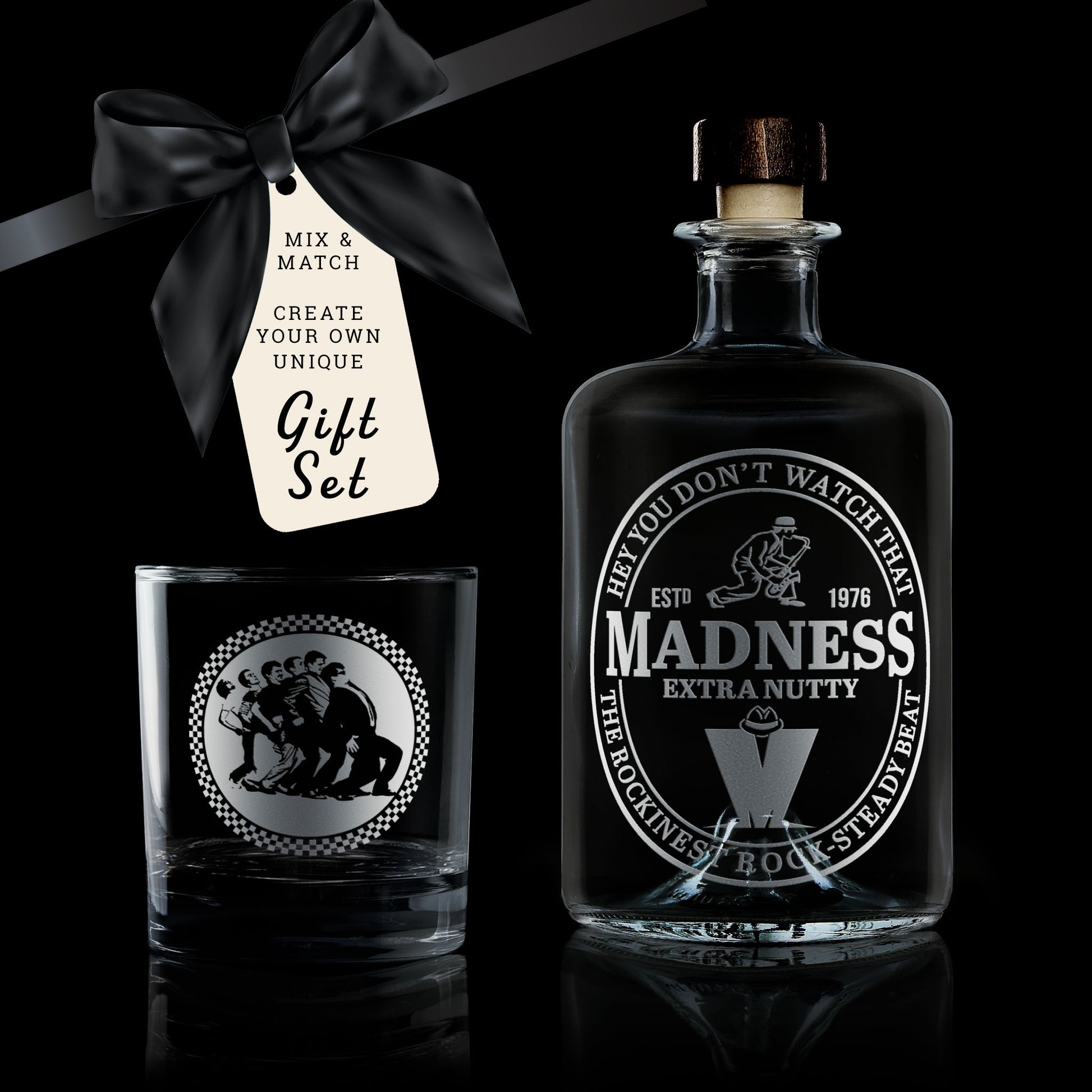 gift set comprising of a whisky glass and decanter engraved with madness nutty boys