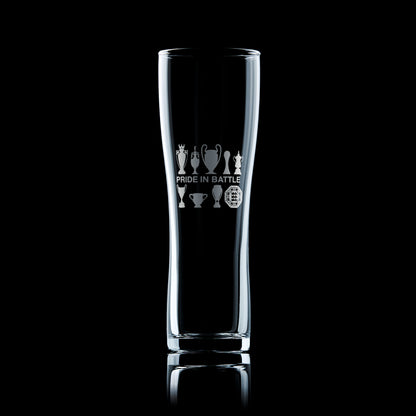 tall beer glass engraved with Manchester city Football Club trophies