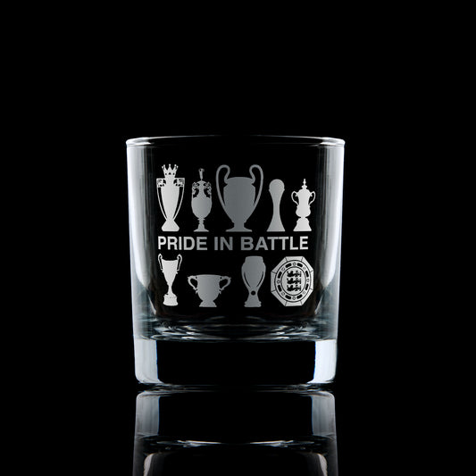 whiskey glass engraved with Manchester city Football Club trophies