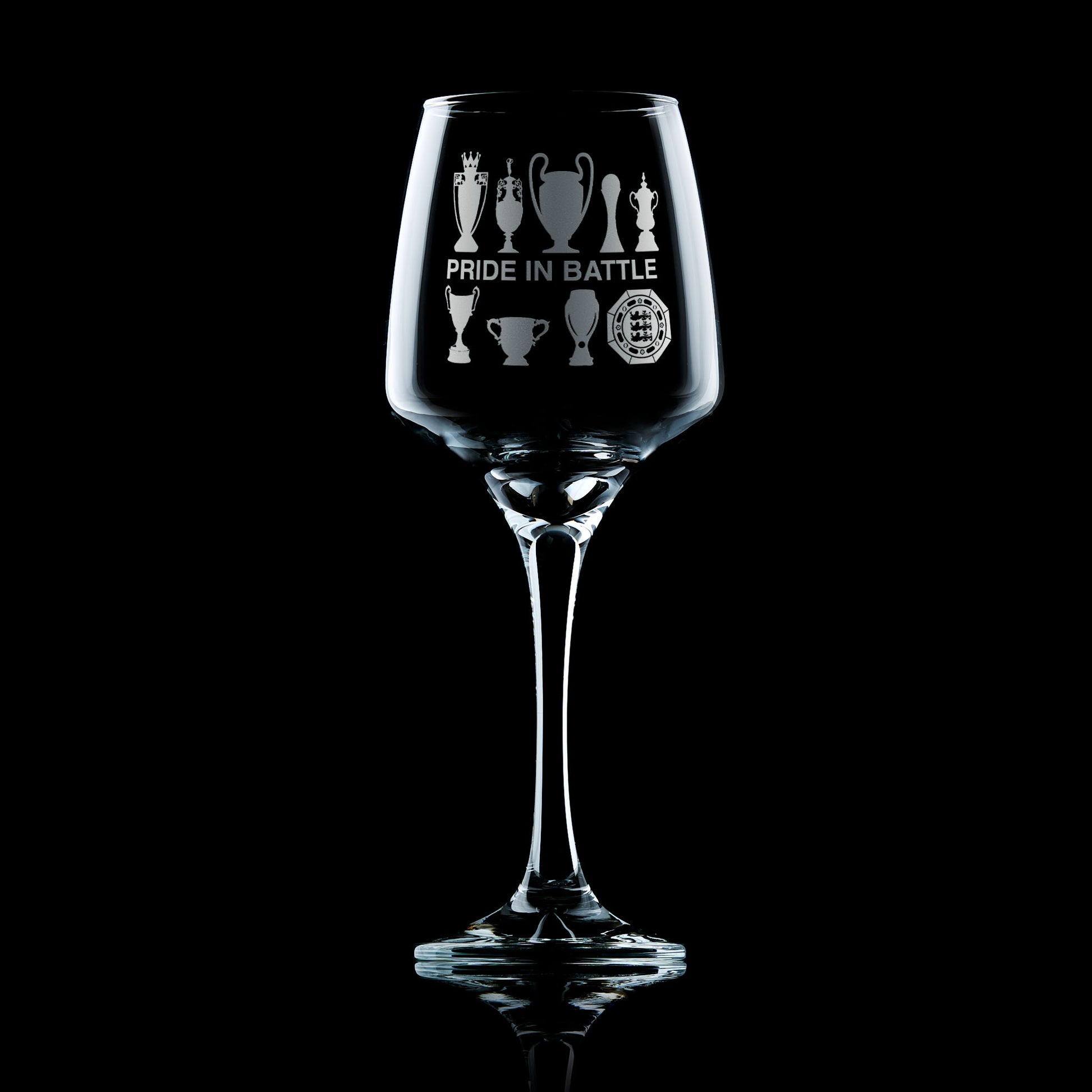 stemmed wine glass engraved with Manchester City Football Club trophies