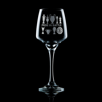 stemmed wine glass engraved with Manchester City Football Club trophies