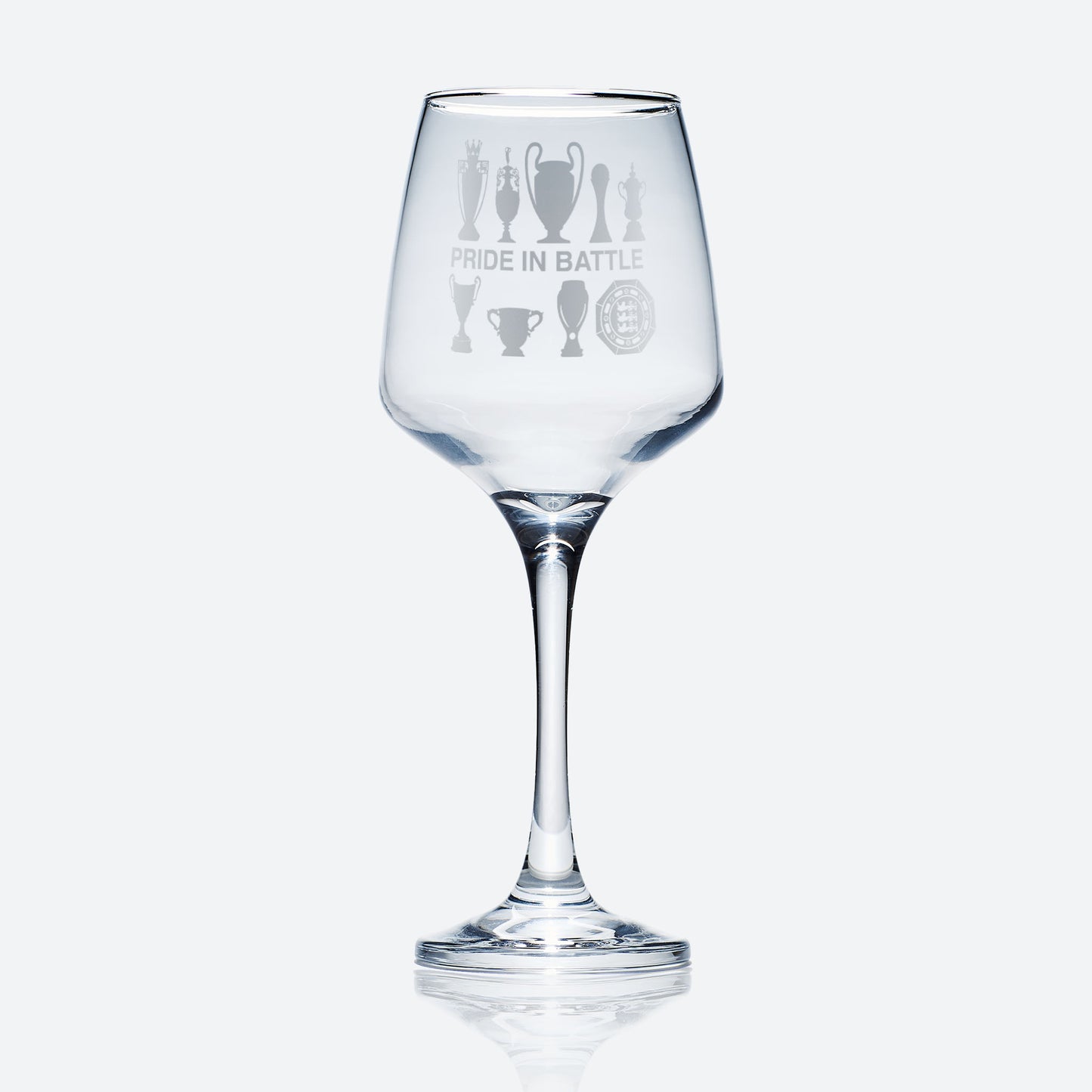 stemmed wine glass engraved with Manchester City Football Club trophies