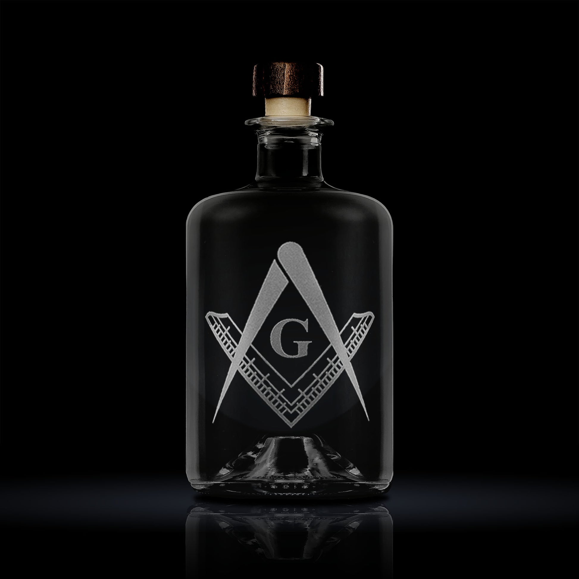 masonic decanter engraved with a master mason's square and compass