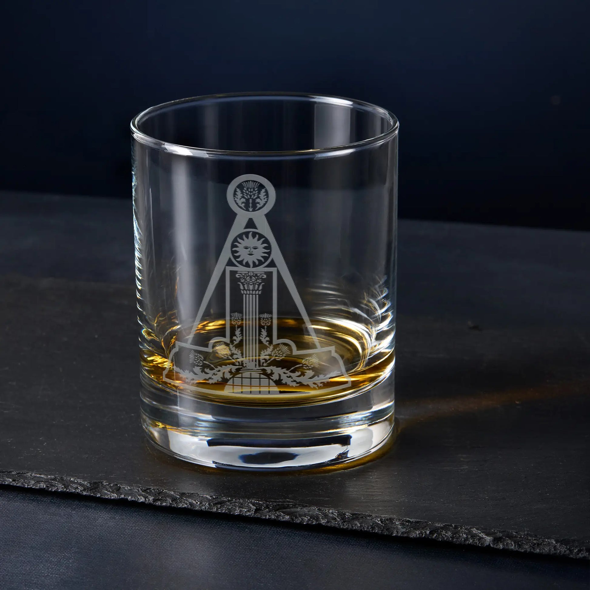 Scottish Constitution Almoner whisky glass engraved with Craft jewel, photographed on black background