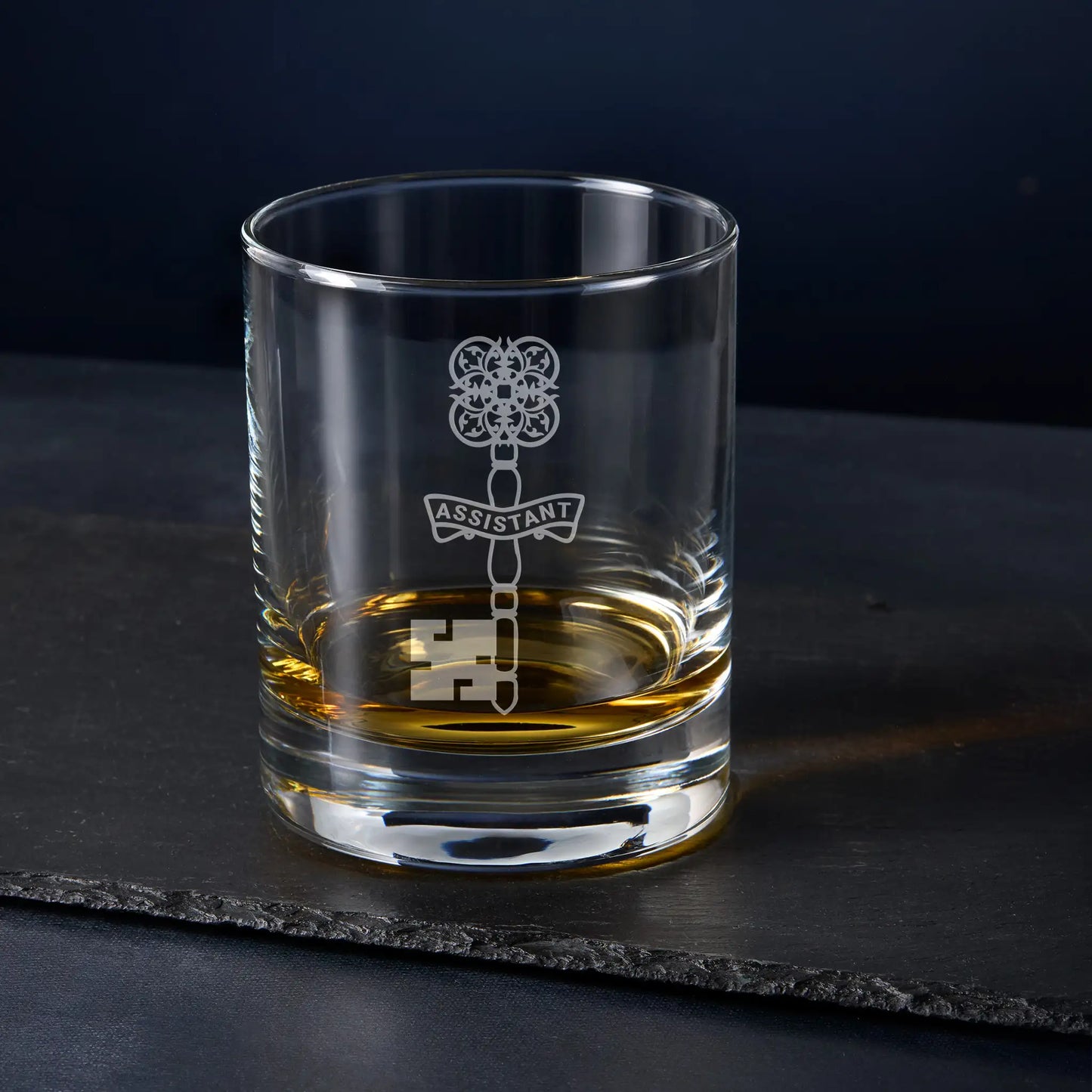 Masonic whisky glass engraved with Assistant Treasurer jewel – English Constitution – black background
