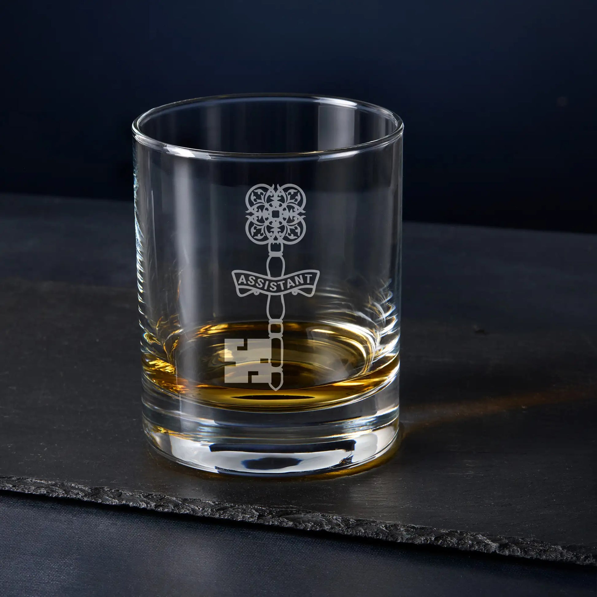 Masonic whisky glass engraved with Assistant Treasurer jewel – English Constitution – black background