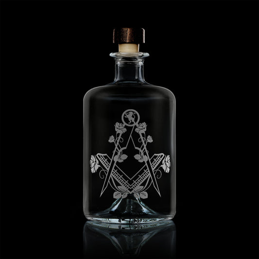 apothecary bottle style whisky decanter engraved with english roses and masonic square and compass