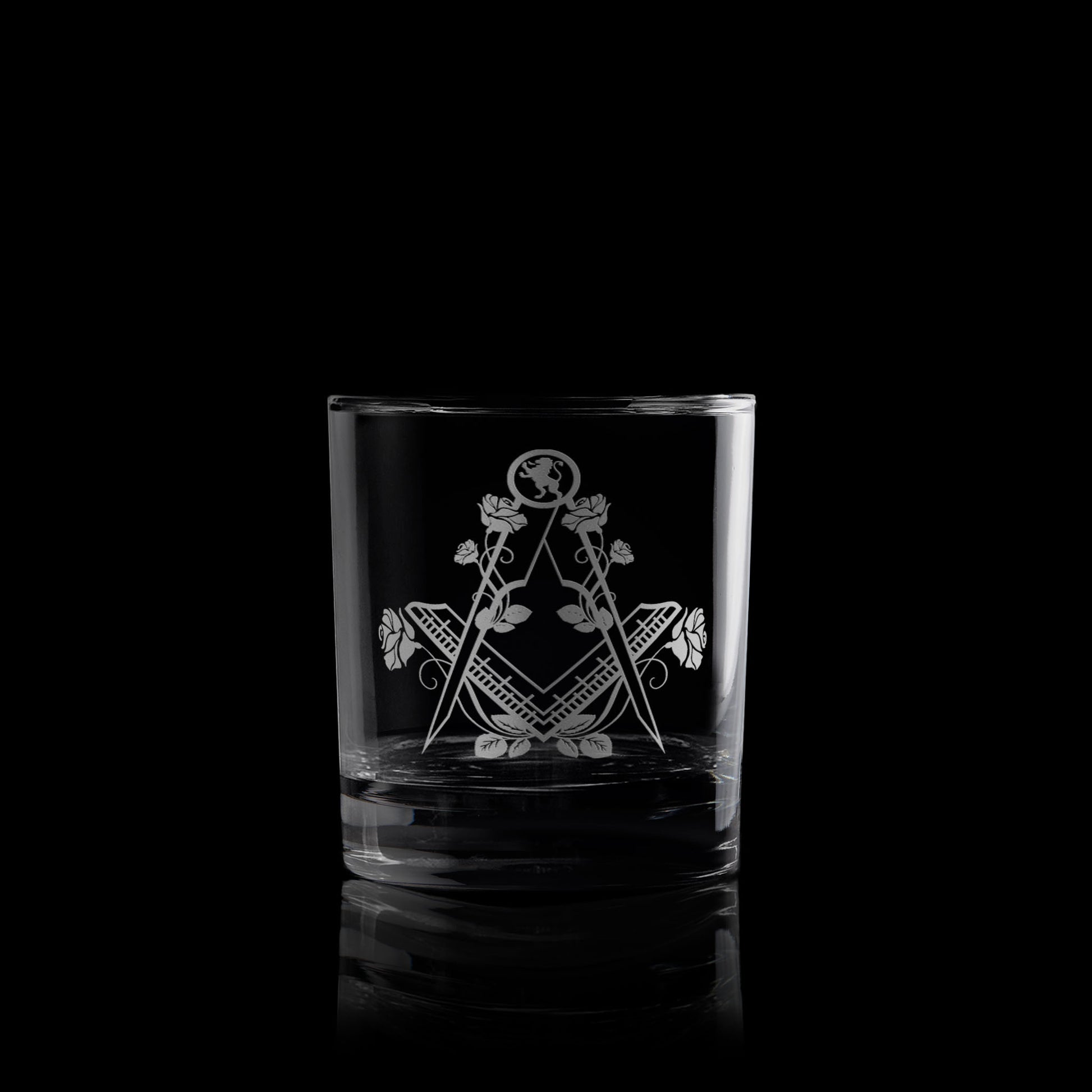 masonic whisky glass engraved with the lion rampant, roses and a square and compass