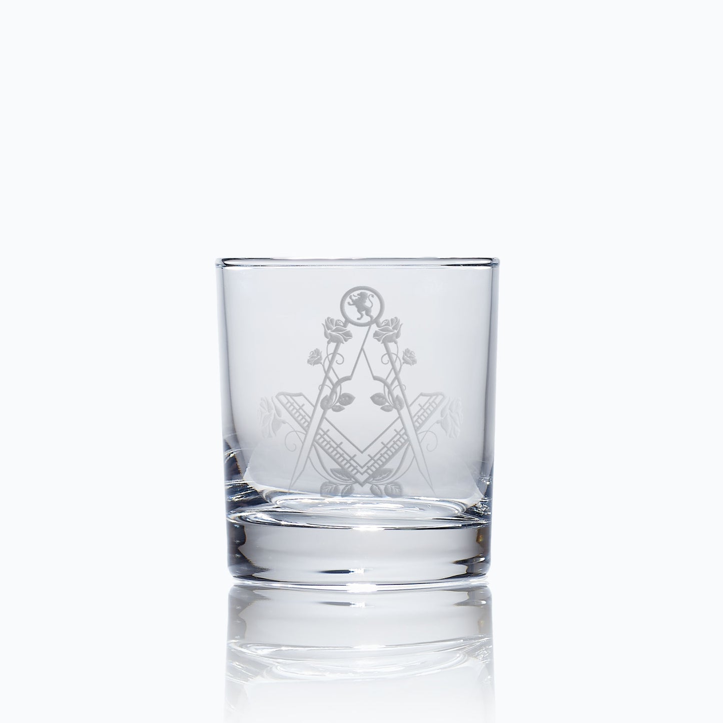 masonic whisky glass engraved with the lion rampant, roses and a square and compass