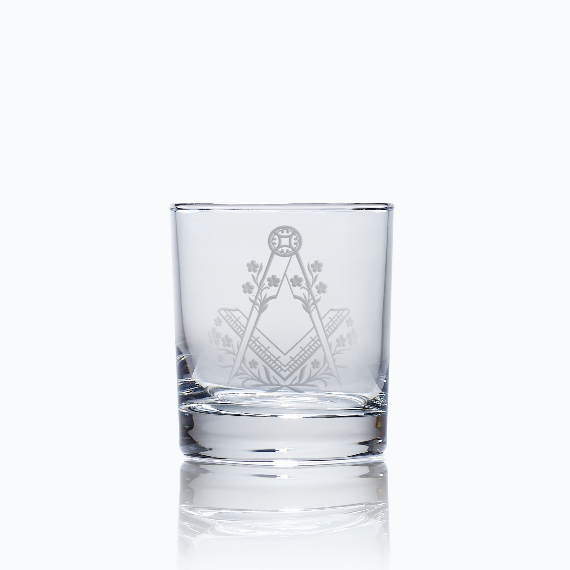 whisky glass engraved with forget me nots and masonic square and compass