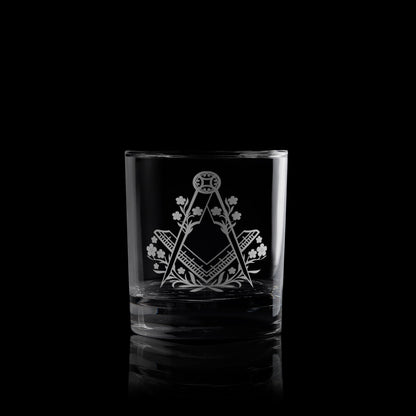 whisky glass engraved with forget me nots and masonic square and compass