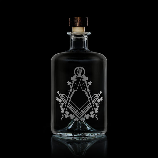 apothecary bottle style whisky decanter engraved with irish shamrocks and masonic square and compass