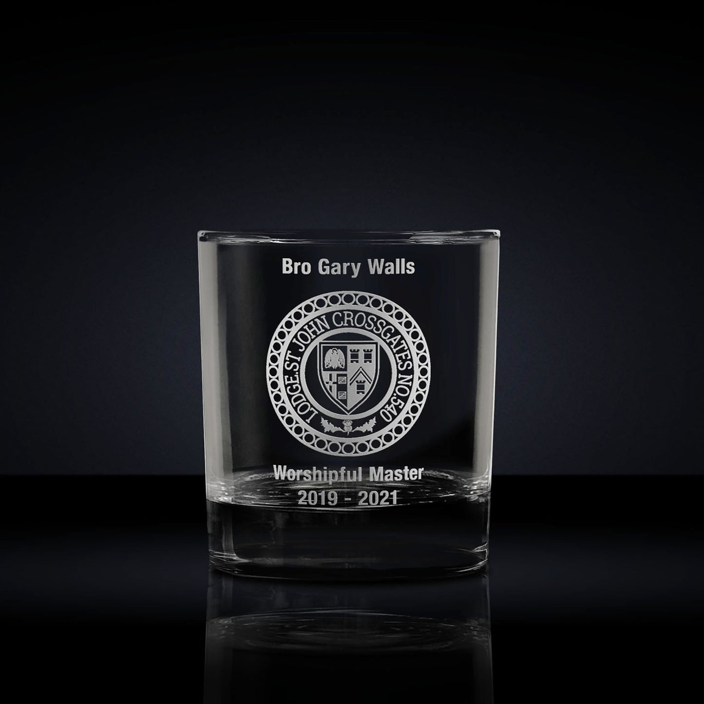 whisky glass engraved with a masonic lodge logo