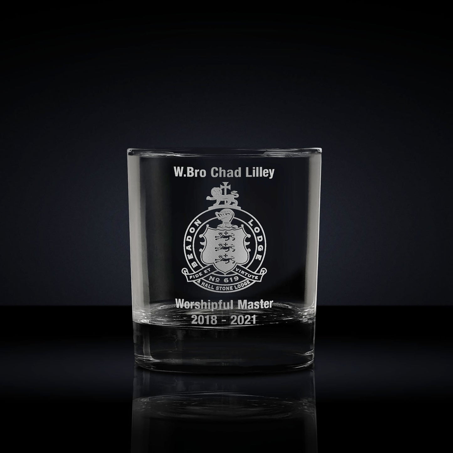 whisky glass engraved with a masonic lodge logo