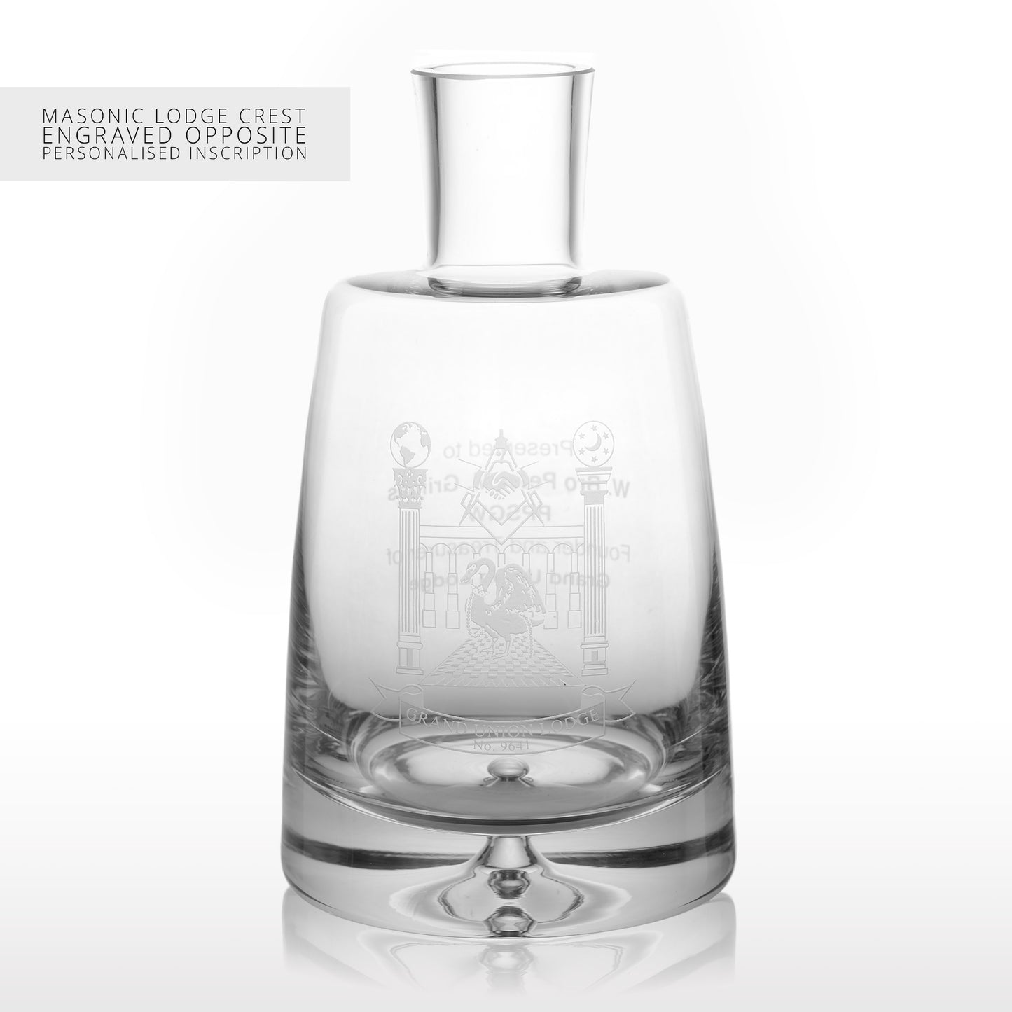 Whisky Decanter with engraved Masonic lodge crest on a white background