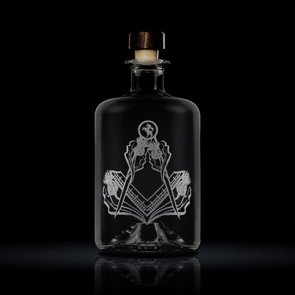 apothecary bottle style whisky decanter engraved with scottish thistles and masonic square and compass