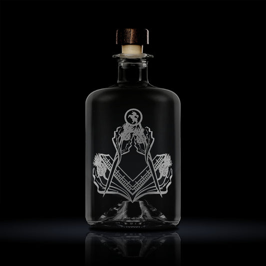 apothecary bottle style whisky decanter engraved with scottish thistles and masonic square and compass