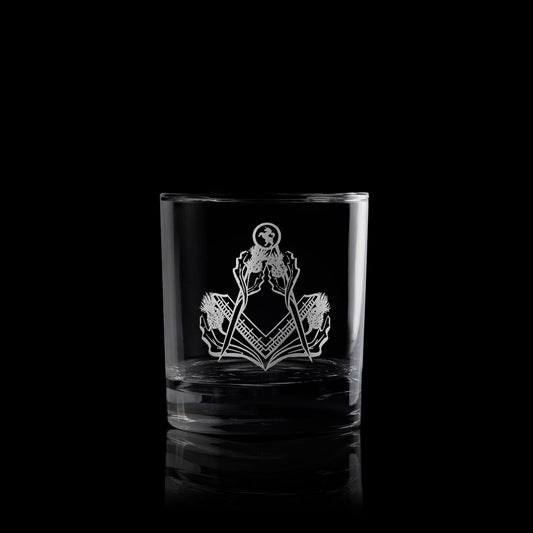 masonic whisky glass engraved with scottish thistles and a square and compass