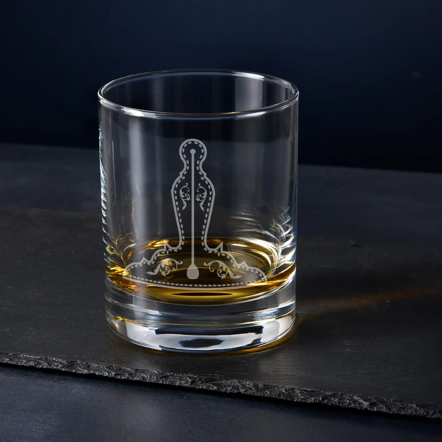 Senior Warden whisky glass engraved with Masonic collar jewel on dark backdrop