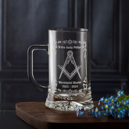 Beer tankard with Masonic square and compass design and personalised text on a dark background
