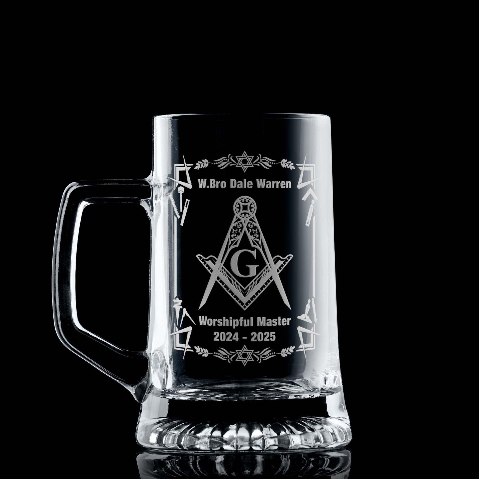 Masonic tankard with filigree Square & Compass and working tools, engraved and shown on black background