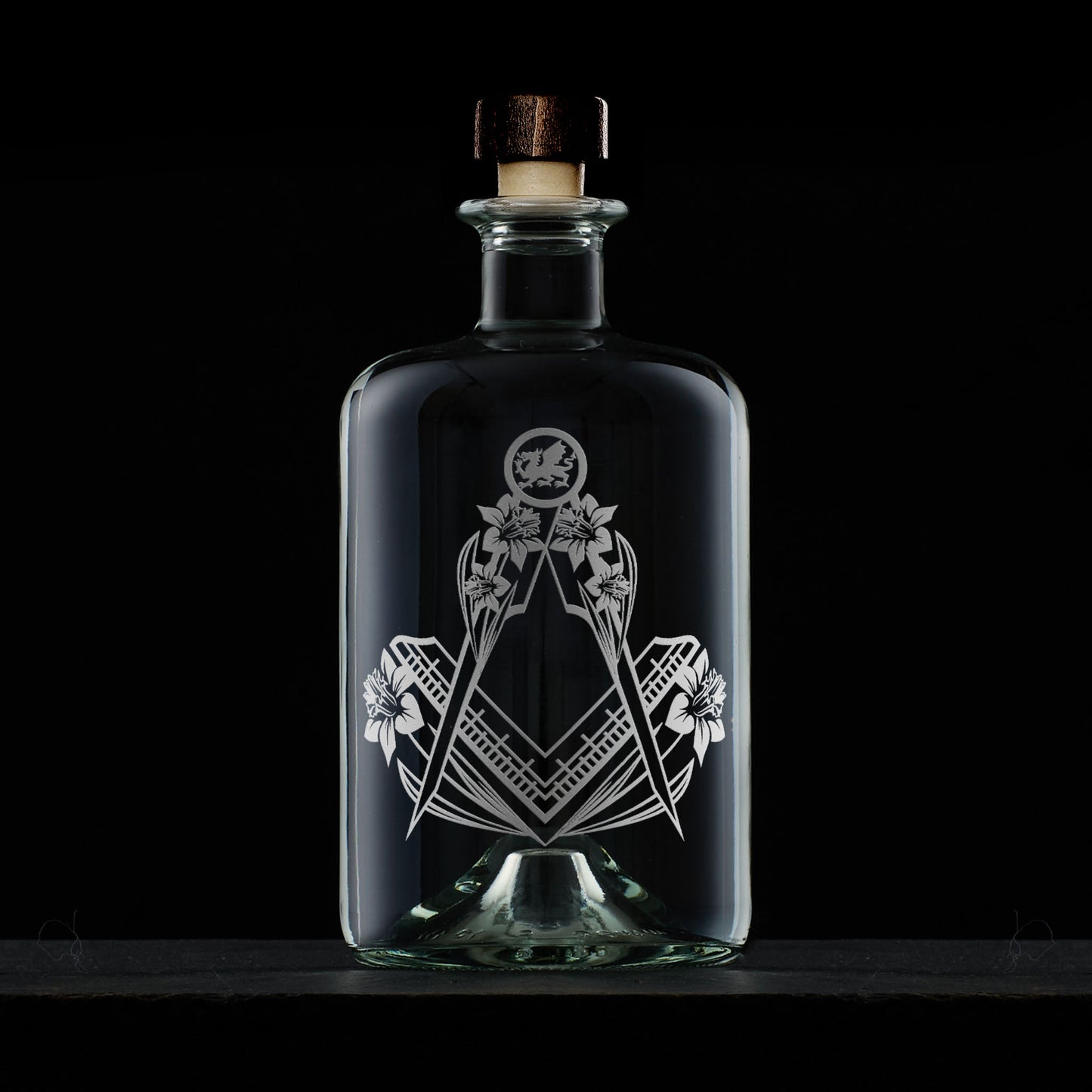 apothecary bottle style whisky decanter engraved with welsh daffodils and masonic square and compass