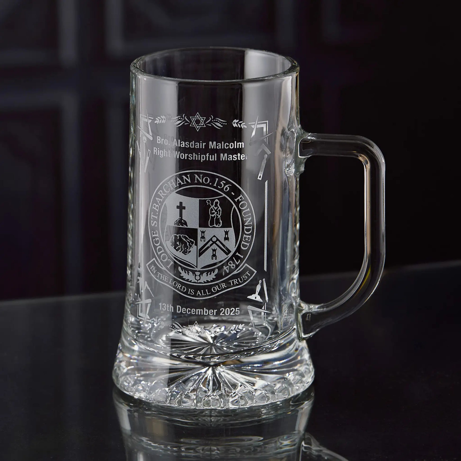 Personalised glass tankard engraved with a masonic lodge crest, square and compass and working tools