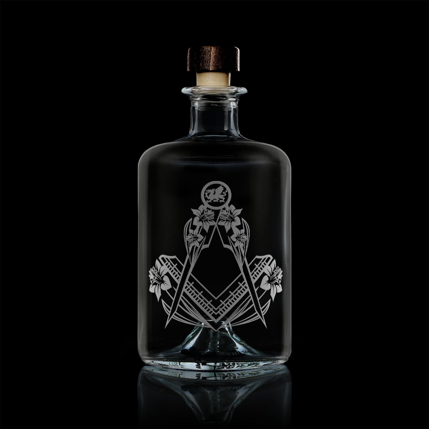 apothecary bottle style whisky decanter engraved with welsh daffodils and masonic square and compass