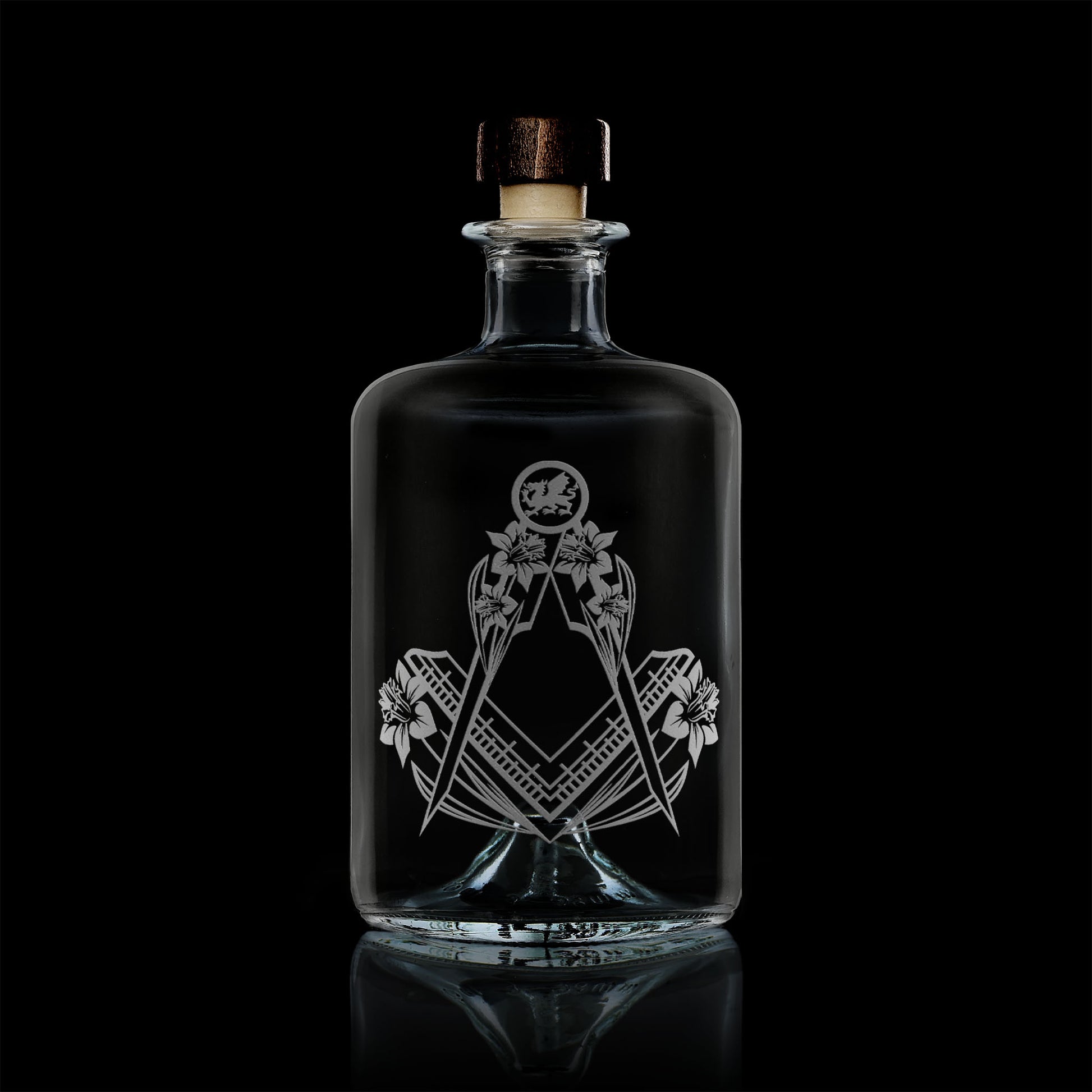 apothecary bottle style whisky decanter engraved with welsh daffodils and masonic square and compass