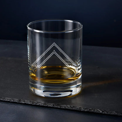 Engraved Worshipful Master whisky glass with collar jewel on black background