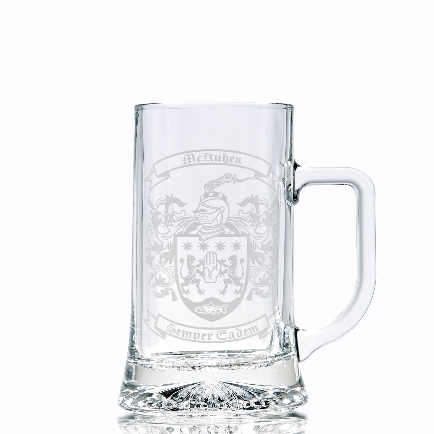 Clear glass tankard with engraved McKuhen crest — deep etch, heirloom finish.