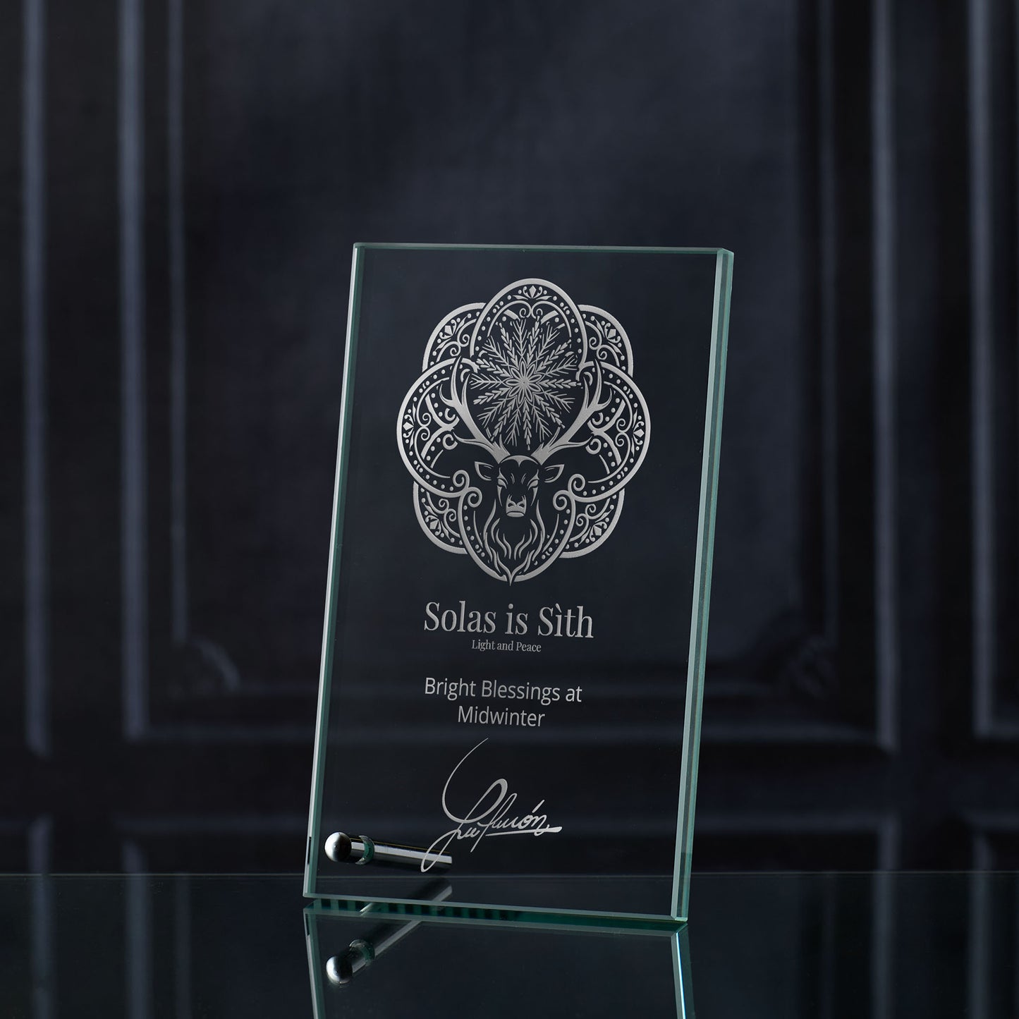 Engraved christmas glass plaque featuring the Midwinter Stag design with Gaelic inscription Light and Peace