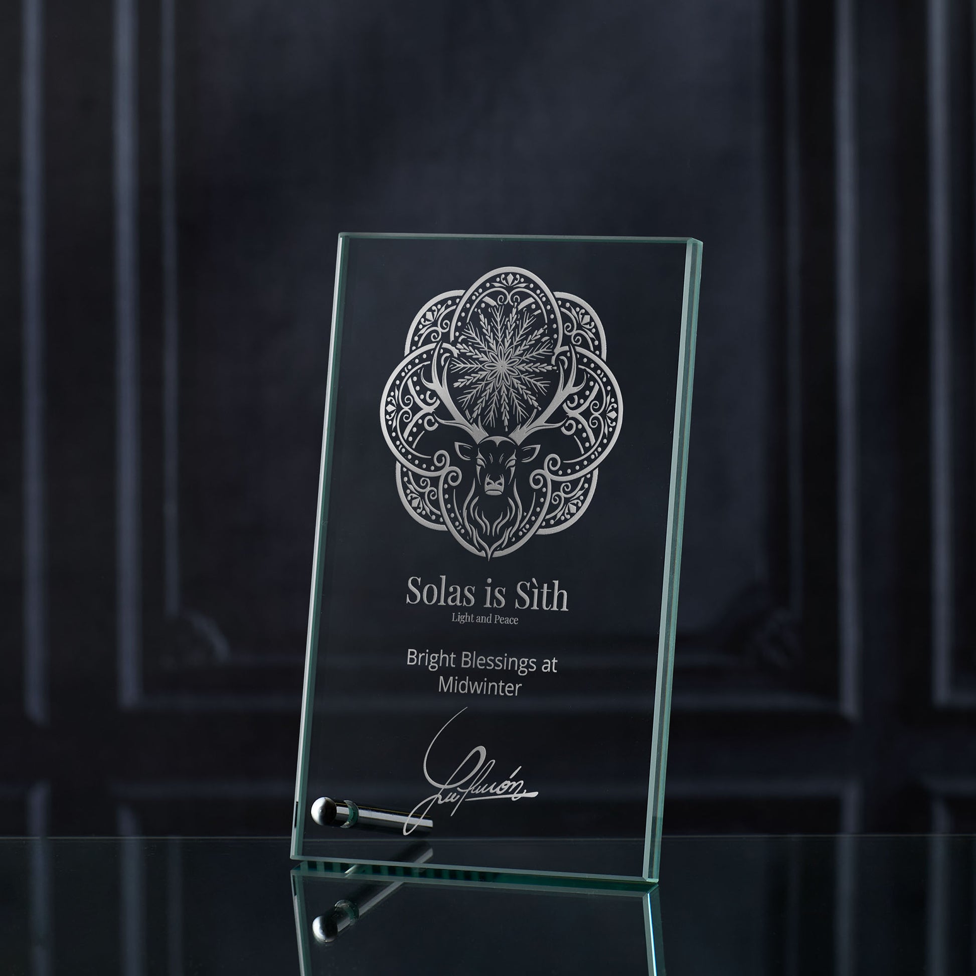 Engraved christmas glass plaque featuring the Midwinter Stag design with Gaelic inscription Light and Peace