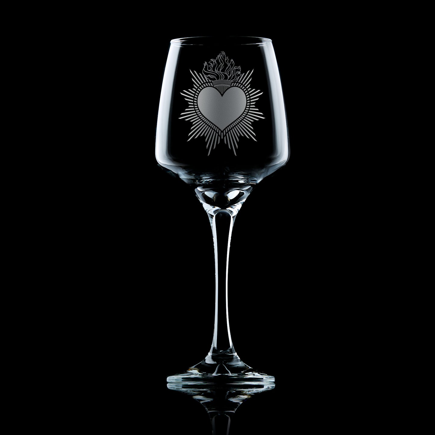 Engraved wine glass with Milagro Heart design in folk art style