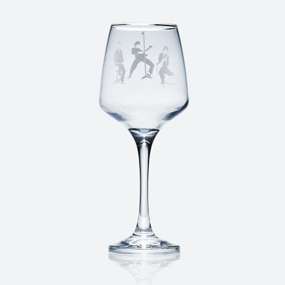 Engraved wine glass featuring a silhouette of a three-piece band – inspired by mod revival style, with guitar, bass, and drums