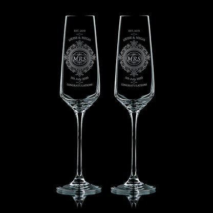 Pair of engraved champagne flutes with Mrs & Mrs titles, names, and lace-inspired design