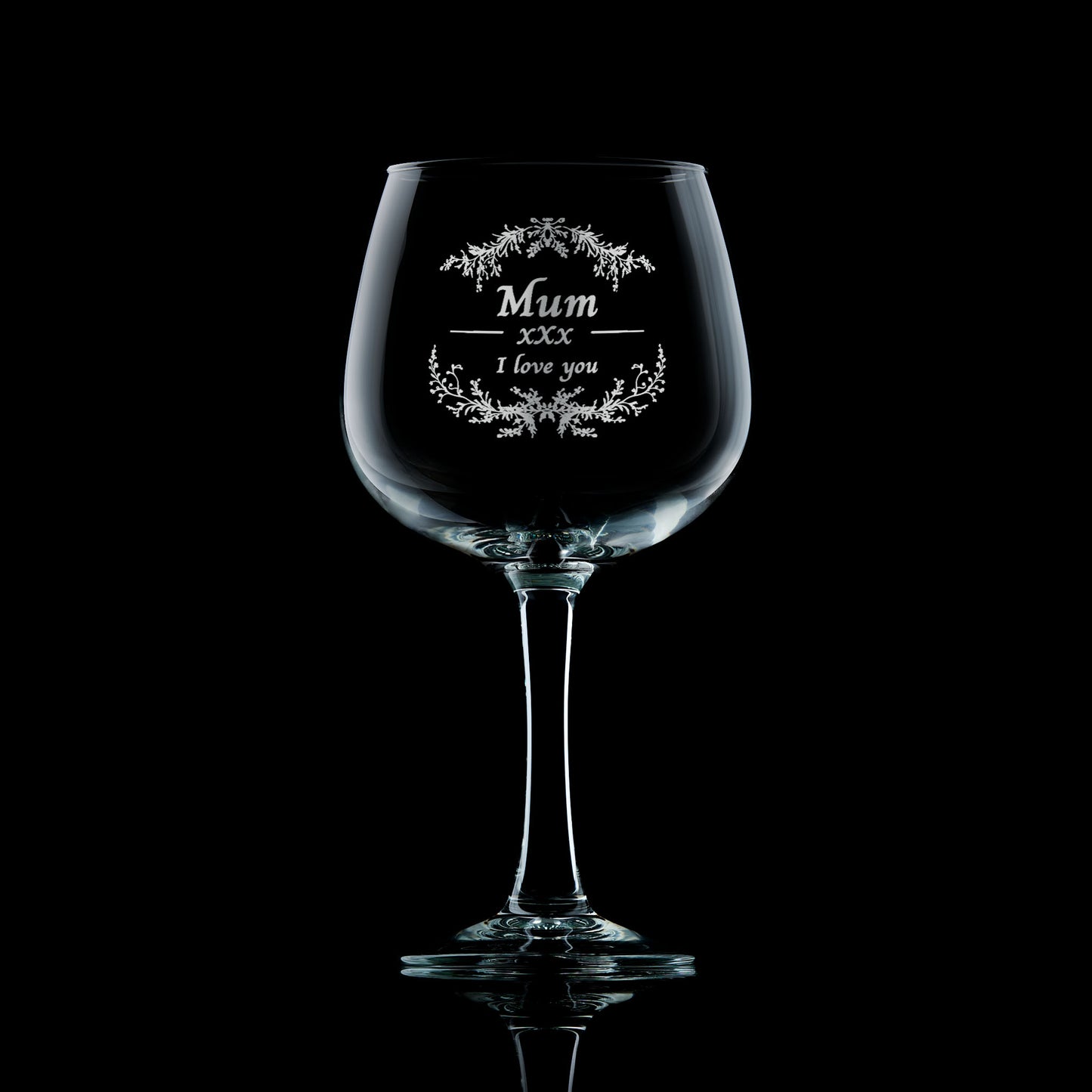 Gin glass engraved with the words “Mum I Love You” surrounded by delicate blossom branches, hand-engraved in Scotland