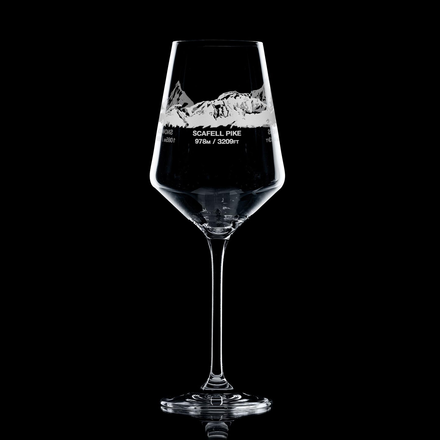UKs higest mountains engraved wine glass on a black background