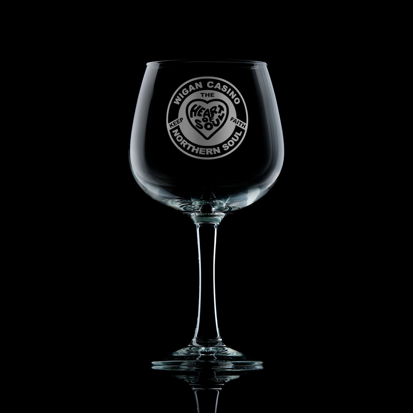 Engraved gin glass with Northern Soul love heart patch design featuring the words “Heart and Soul” and “Keep the Faith”