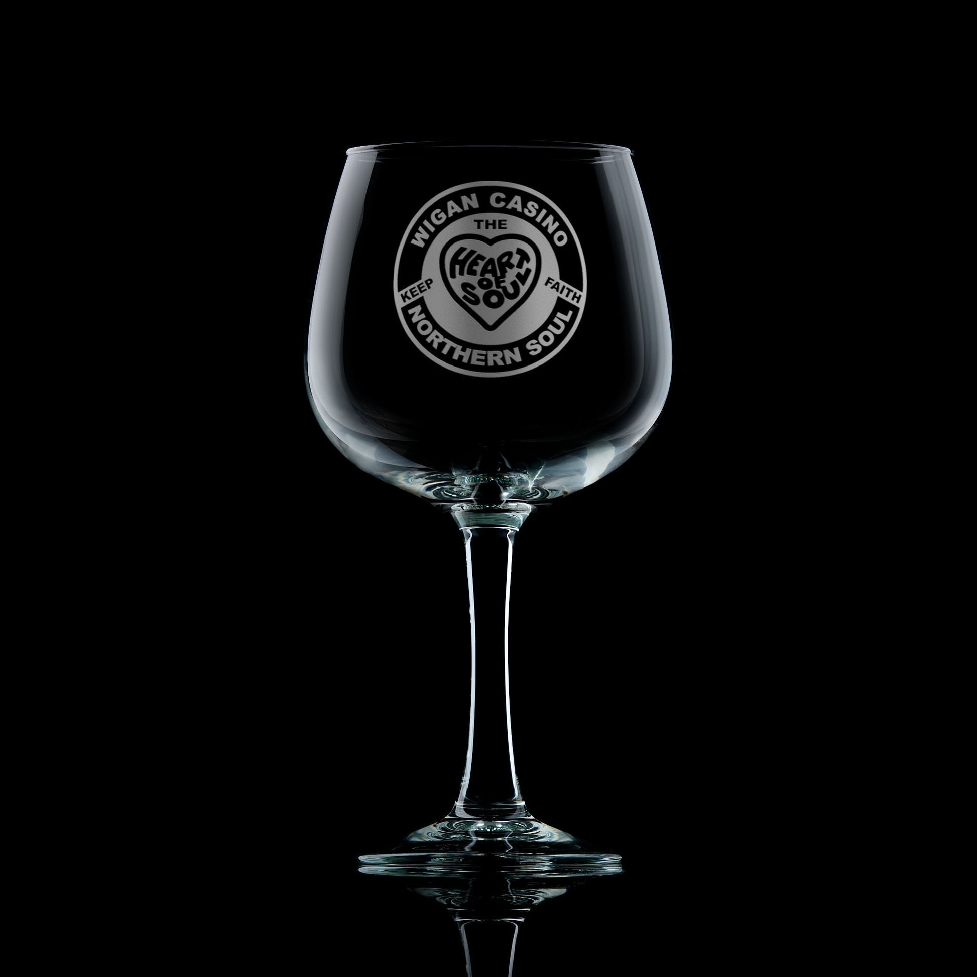 Engraved gin glass with Northern Soul love heart patch design featuring the words “Heart and Soul” and “Keep the Faith”