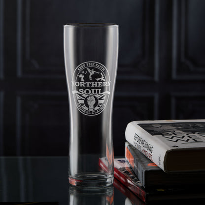 Northern Soul pint glass with a keep the faith clenched fist and original classics design on a dark background