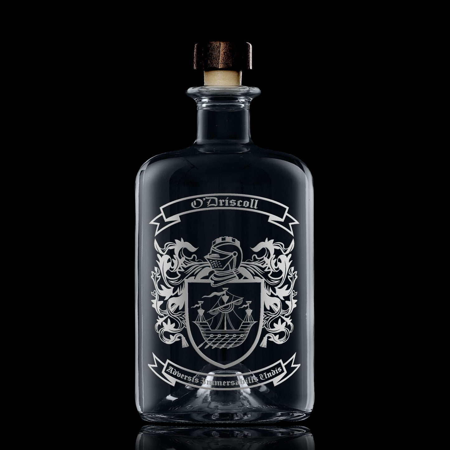 Heraldic coat of  arms engraved on apothecary decanter with stopper — balanced placement, satin finish.